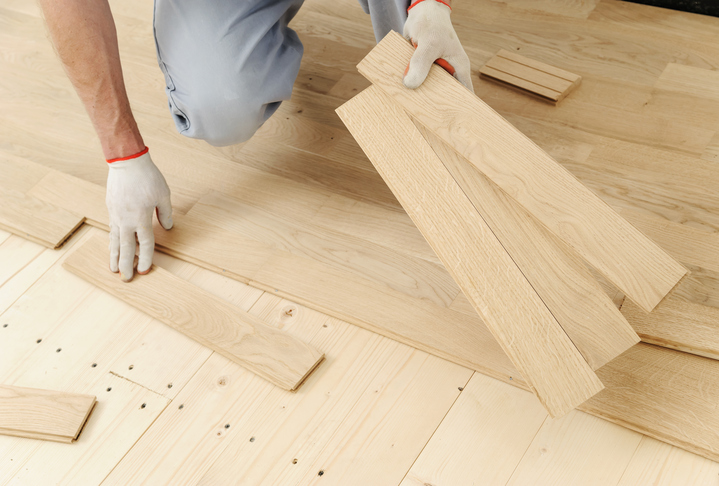 how to install hardwood floor near wall